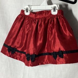NWT Gymboree red shiny skirt with black trim and bows size 5T, age 4-5